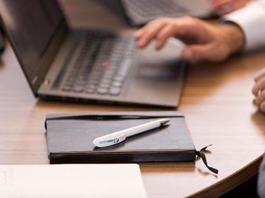 Laptop and notepad with Prologis Pen