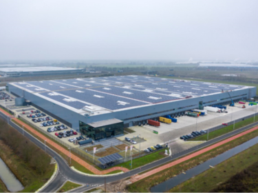 Bird View of Warehouse with solar panels on the roof