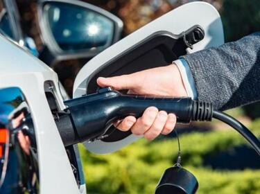 Charging car with plug