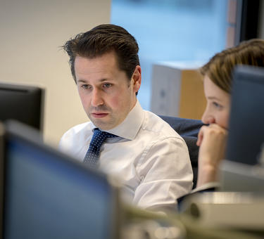 Two Prologis employees looking at a computer screen