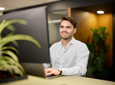 Prologis employee looking at a monitor Prologis employee looking at a monitor
